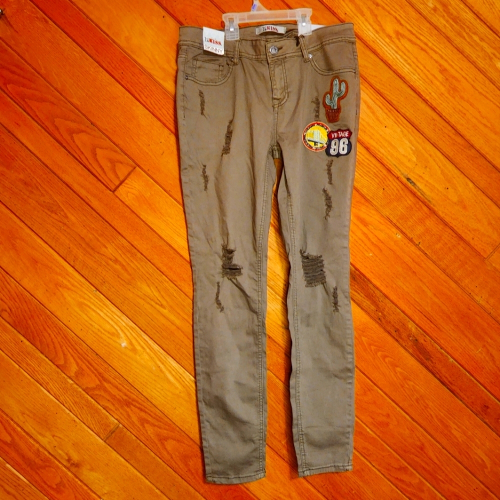 1st Kiss size 11 green frayed skinny jeans with vintage traveler patches